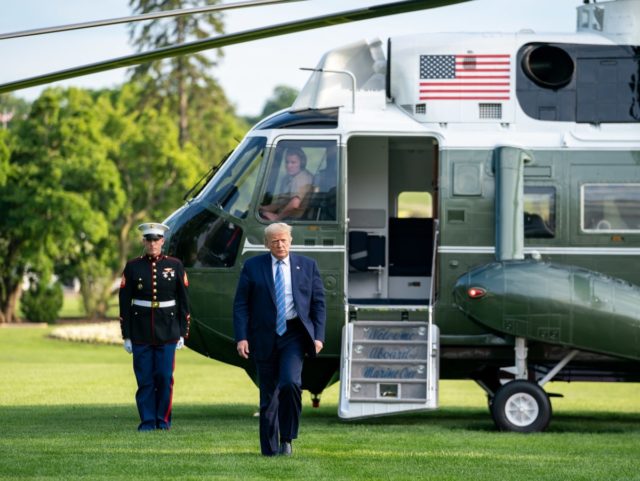 President Donald J. Trump walks across the South Lawn of the White House after disembarking Marine One Sunday, June 14, 2020, concluding his trip to Bedminster, N.J. (Official White House Photo by Tia Dufour)