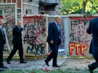 US President Donald Trump walks back to the White House escorted by the Secret Service after appearing outside of St John's Episcopal church across Lafayette Park in Washington, DC on June 1, 2020. - US President Donald Trump was due to make a televised address to the nation on Monday …