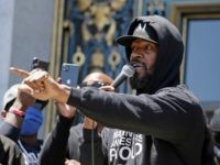 Jamie Foxx speaks to a large crowd during a "kneel-in" to protest police racism on the steps of City Hall Monday, June 1, 2020, in San Francisco. (AP Photo/Eric Risberg)