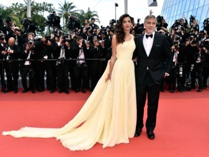 CANNES, FRANCE - MAY 12: Actor George Clooney and his wife Amal Clooney attend the "Money Monster" premiere during the 69th annual Cannes Film Festival at the Palais des Festivals on May 12, 2016 in Cannes, France. (Photo by Pascal Le Segretain/Getty Images)