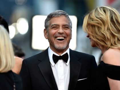 CANNES, FRANCE - MAY 12: Actress Julia Robert and actor George Clooney attend the "Money Monster" premiere during the 69th annual Cannes Film Festival at the Palais des Festivals on May 12, 2016 in Cannes, France. (Photo by Pascal Le Segretain/Getty Images)