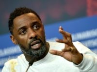 British actor, director and executive producer Idris Elba speaks during a press conference to present the film "Yardie" shown in the "Panorama Special" category during the 68th edition of the Berlinale film festival in Berlin on February 22, 2018. / AFP PHOTO / Stefanie Loos (Photo credit should read STEFANIE …