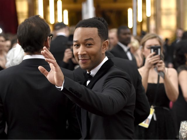 John Legend arrives at the Oscars on Sunday, Feb. 22, 2015, at the Dolby Theatre in Los Angeles. (Photo by Chris Pizzello/Invision/AP)