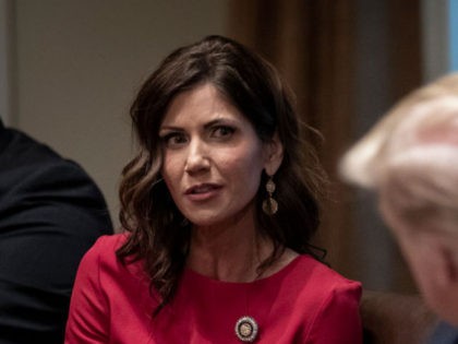 WASHINGTON, DC - DECEMBER 16: (L-R) Governor of South Dakota Kristi Noem speaks as U.S. President Donald Trump listens during a meeting about the Governors Initiative on Regulatory Innovation in the Cabinet Room of the White House on December 16, 2019 in Washington, DC. President Trump encouraged further action to …