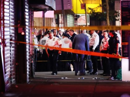 NEW YORK, NEW YORK - JUNE 03: Police gather at the scene where two New York City police of