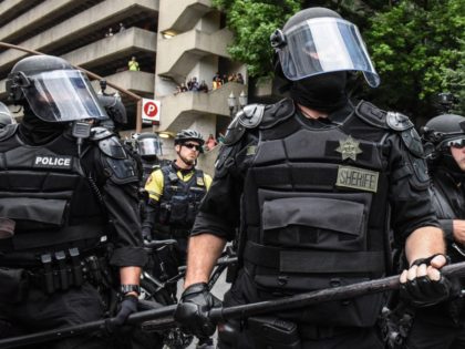 PORTLAND, OR - AUGUST 17: Portland police respond to protesters during an alt-right rally on August 17, 2019 in Portland, Oregon. Anti-fascism demonstrators gathered to counter-protest a rally held by far-right, extremist groups. (Photo by Stephanie Keith/Getty Images)