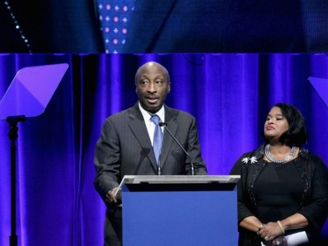 Merck CEO Kenneth Frazier, shown here in 2018 accepting a civil rights award, called on co