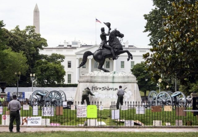 Trump threatens arrest, prison for activists who target statues