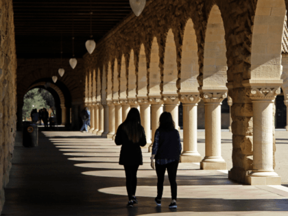 In this March 14, 2019, file photo students walk on the Stanford University campus in Sant
