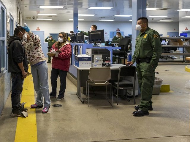 Brown Field Station Border Patrol agents work with staff during medical screening and processing of illegal aliens crossing the Mexican border into Texas. (Photo: U.S. Customs and Border Protection/Mani Albrecht)