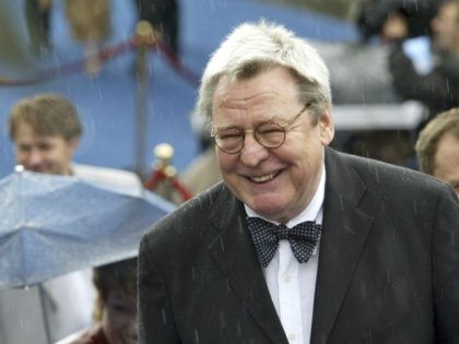 Film director Alan Parker smiles at the opening ceremony of 26th Moscow International Film