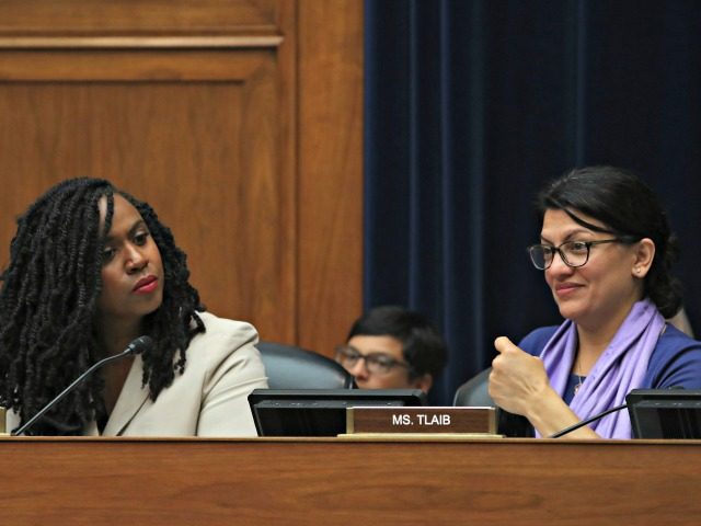 WASHINGTON, DC - JULY 25: Rep. Ayanna Pressley, (D-MA) (L), and Rep. Rashida Tlaib, (D-MI) attend a House Economic and Consumer Policy Subcommittee which is examining JUUL's role in the youth nicotine epidemic, on July 25, 2019 in Washington, DC. (Photo by Mark Wilson/Getty Images)