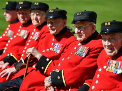 (L-R) Chelsea Pensioners who are World War Two Battle of Normandy and D-Day veterans Roy Cadman, James George, Bill Fitzgerald, Ernie Boyden, Fran Mouque and George Skipper pose for a photograph at The Royal Hospital Chelsea in London on May 13, 2019. - 2019 marks the 75th Anniversary of the …