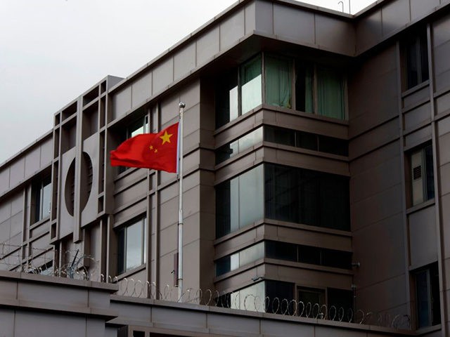 The Chinese flag flies outside of the Chinese consulate in Houston after the US State Department ordered China to close the consulate in Houston, Texas, July 22, 2020. - US-Chinese tensions, already rising because of the coronavirus pandemic and crackdown in Hong Kong, ratcheted up another notch on Wednesday as …