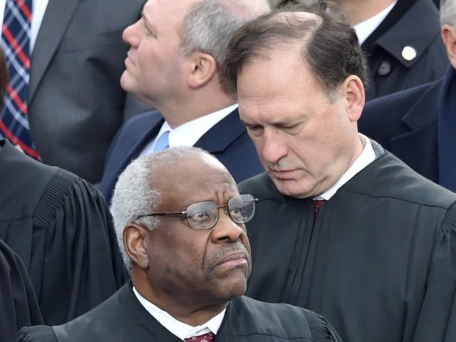 Clarence Thomas and Samuel Alito (Paul J. Richards / AFP / Getty)