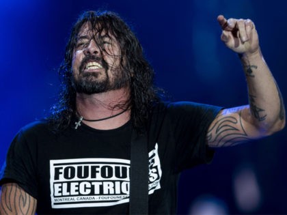 US singer and guitarist Dave Grohl of US rock band Foo Fighters performs onstage during the Rock in Rio festival at the Olympic Park, Rio de Janeiro, Brazil, on September 28, 2019. - The week-long Rock in Rio festival starts last Friday, September 27, with international stars as headliners, over …