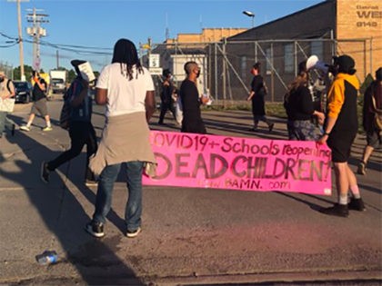 Detroit protesters block a school bus yard