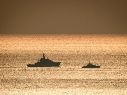 DOVER, ENGLAND - JANUARY 04: HMS Mersey (L) is seen travelling in convoy with a Border Force Cutter in the English Channel after being deployed by the Ministry of Defence to assist in searching the area for migrant boats on January 04, 2019 in Dover, England. Following a number of …