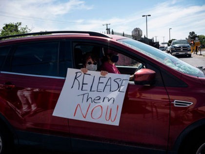 Protesters drive in a caravan around Immigration and Customs Enforcement El Paso Processing Center to demand the release of ICE detainees due to safety concerns amidst the COVID-19 outbreak on April 16, 2020 in El Paso, Texas. - One detainee has already tested positive in the nearby Otero County Processing …