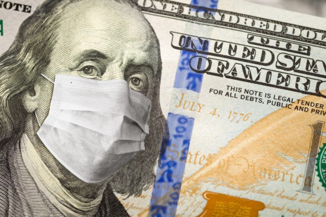 One Hundred Dollar Bill With Medical Face Mask.