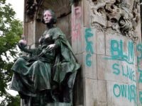 A statue of Britain's Queen Victoria stands defaced in Woodhouse Moor Park in Leeds, northern England on June 10, 2020. (Photo by PAUL ELLIS / AFP) (Photo by PAUL ELLIS/AFP via Getty Images)