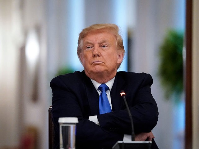 WASHINGTON, DC - JULY 13: U.S. President Donald Trump listens during an event about citizens positively impacted by law enforcement, in the East Room of the White House on July 13, 2020 in Washington, DC. The president highlighted life-saving actions by law enforcement officers and cited these examples as a …