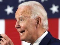WILMINGTON, DELAWARE - JUNE 30: Democratic presidential candidate, former Vice President Joe Biden holds up a mask as he speaks during a campaign event June 30, 2020 at Alexis I. Dupont High School in Wilmington, Delaware. Biden discussed the Trump Administration‚Äôs handling of the COVID-19 pandemic. (Photo by Alex Wong/Getty …