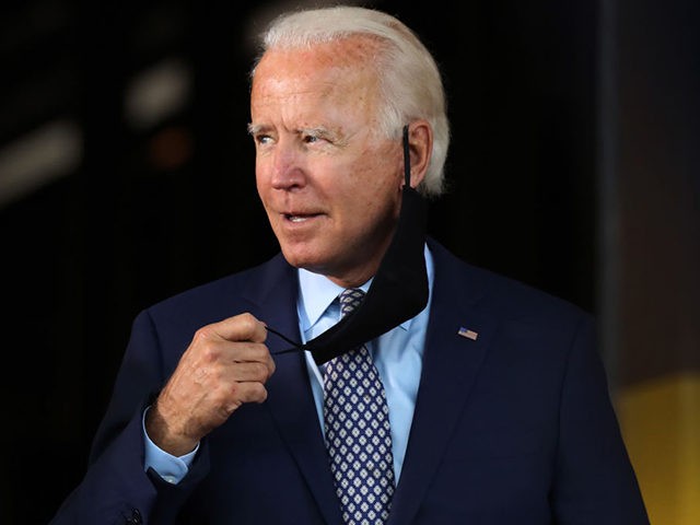 DUNMORE, PENNSYLVANIA - JULY 09: The presumptive Democratic presidential nominee Joe Biden walks on to stage as he speaks at McGregor Industries on July 09, 2020 in Dunmore, Pennsylvania. The former vice president, who grew up in nearby Scranton, toured a metal works plant in Dunmore in northeastern Pennsylvania and …