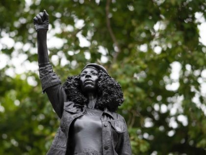 BRISTOL, ENGLAND - JULY 15: A new sculpture, by local artist Marc Quinn, of Black Lives Matter protestor Jen Reid stands on the plinth where the Edward Colston statue used to stand on July 15, 2020 in Bristol, England. A statue of slave trader Edward Colston was pulled down and …