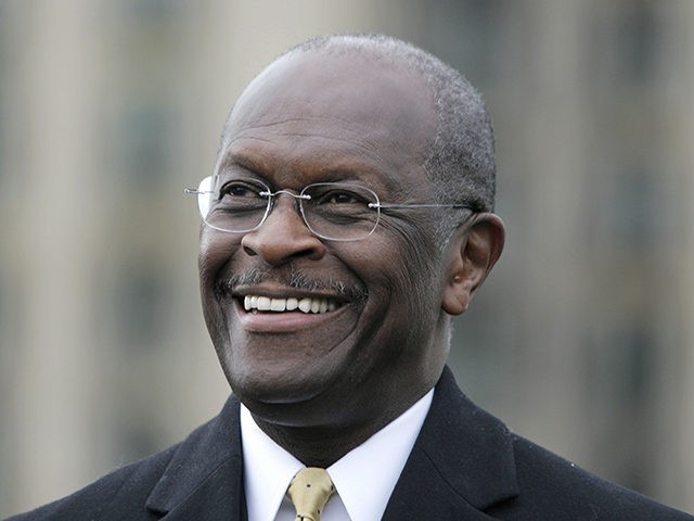 DETROIT, MI - OCTOBER 21: Republican presidential candidate Herman Cain speaks while unveiling his "Opportunity Zone" economic plan in front of the Michigan Central Station, an abandoned train depot, October 21, 2011 in Detroit, Michigan. Cain has reportedly proposed changes to his "9-9-9" tax plan to exempt taxes for those …