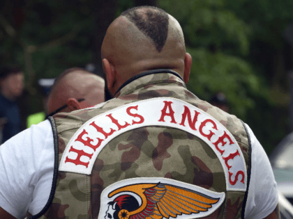 Members of the Hells Angels motorcycle club arrive for the Hells Angels' World Run 2016 gathering on June 3, 2016 in Rynia near Warsaw. More than a thousand Hells Angels members from all over Europe and beyond arrived to the resort on the Zegrze lagoon for some days rally. / …