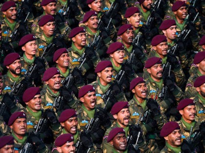 Indian Army's Parachute Regiment soldiers march along Rajpath during the Republic Day parade in New Delhi on January 26, 2020. - Huge crowds gathered for India's Republic Day parade on January 26, with women taking centre-stage at the annual pomp-filled spectacle of military might featuring army tanks, horses and camels. …
