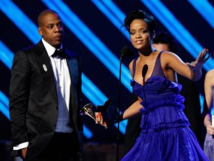 LOS ANGELES, CA - FEBRUARY 10: Rapper Jay-Z (L) and singer Rihanna accept the Best Rap/Sung Collaberation award onstage during the 50th annual Grammy awards held at the Staples Center on February 10, 2008 in Los Angeles, California. (Photo by Kevin Winter/Getty Images)