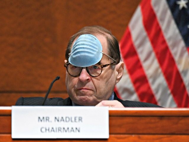 House Judiciary Committee Chairman Jerry Nadler, D-N.Y., adjusts his mask to drink a beverage during a House Judiciary Committee markup of the Justice in Policing Act of 2020 on Capitol Hill in Washington, Wednesday, June 17, 2020. (Erin Scott/Pool via AP)