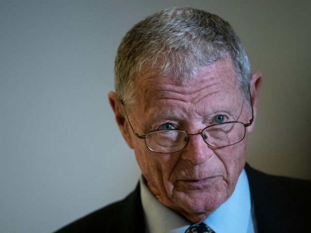 Sen. James Inhofe (R-OK) talks with reporters before a Senate GOP lunch meeting in the Russell Senate Office Building on Capitol Hill March 20, 2020 in Washington, DC. Lawmaker and Trump administration officials are in negotiations about the phase 3 coronavirus stimulus bill, which leaders say they hope to have …