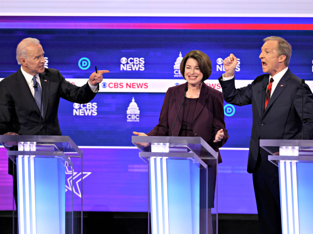 CHARLESTON, SOUTH CAROLINA - FEBRUARY 25: Democratic presidential candidates former Vice President Joe Biden (L) and Tom Steyer (R) debate as Sen. Amy Klobuchar (D-MN) reacts during the Democratic presidential primary debate at the Charleston Gaillard Center on February 25, 2020 in Charleston, South Carolina. Seven candidates qualified for the …
