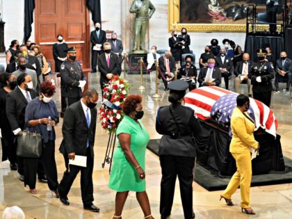 WASHINGTON, DC - JULY 27: Family members depart at the conclusion of memorial ceremony for former Rep. John Lewis (D-GA) in the Capitol Rotunda on July 27, 2020 in Washington, DC. Lewis, a civil rights icon and fierce advocate of voting rights for African Americans, will lie in state at …