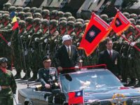 Taiwan President Lee Teng-hui inspects a newly restructured army brigade during military drills on the offshore island of Penghu, close to the Chinese mainland, 18 May, 1999. The defense ministry said the brigade was 75 percent stronger in firepower after the reforms. AFP PHOTO (Photo by TAO-CHUAN YEH / AFP) …