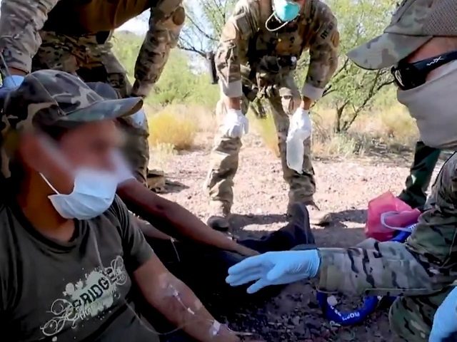 Border Patrol BORSTAR agents from the El Centro Sector provide medical assistance to dehydrated migrants in Southern California. (Twitter Video Screencapture/U.S. Customs and Border Protection)