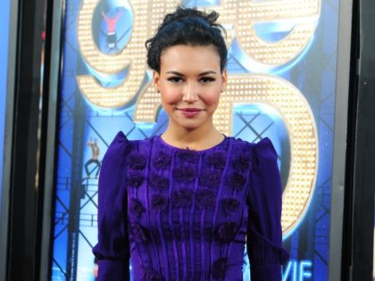 Actress Naya Rivera poses for the cameras as cast members from the hit TV series Glee and