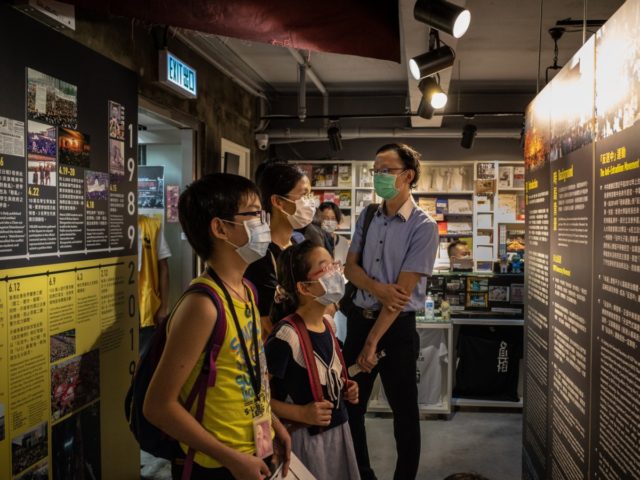 HONG KONG, CHINA - MAY 20: Visitors look at items on display at the June 4 Museum, dedicat