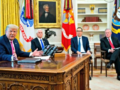 WASHINGTON, DC - JULY 20: U.S. President Donald Trump talks to reporters while hosting (2nd L-R) Vice President Mike Pence, Treasury Secretary Steven Mnuchin, White House Chief of Staff Mark Meadows and Republican congressional leaders in the Oval Office at the White House July 20, 2020 in Washington, DC. Trump …