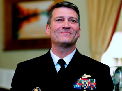 FILE - In this April 16, 2018, file photo, U.S. Navy Rear Adm. Ronny Jackson, M.D., sits before a meeting on Capitol Hill in Washington. Jackson, who abandoned his nomination to be secretary of Veterans Affairs amid numerous allegations, will not return to the job of President Donald Trump's personal …