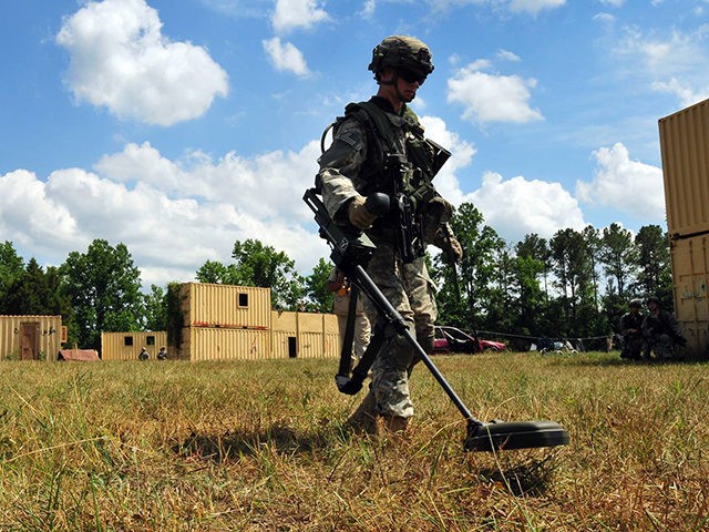 Paratroopers assigned to Company C, 2-501 PIR, 1st Brigade Combat Team, 82nd Airborne Division participate in a company attack training lane, June 24, at Fort Pickett, Va., during eXportable Combat Training Capability Rotation 14-01. (U.S. Army photo by Sgt. Juan F. Jimenez)
