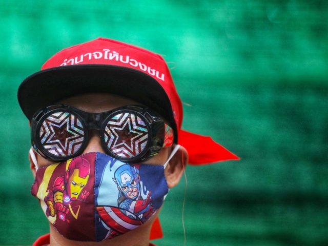 A protester wears a face mask as he takes part in a demonstration in front of the army headquarters in Bangkok on July 20, 2020. (Photo by Vivek PRAKASH / AFP) (Photo by VIVEK PRAKASH/AFP via Getty Images)