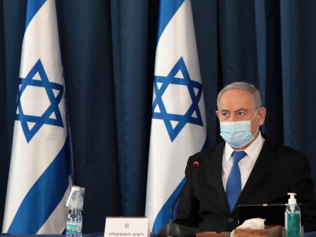 Israeli Prime Minister Benjamin Netanyahu wears a protective mask as he opens the weekly cabinet meeting at the foreign ministry in Jerusalem on July 5, 2020. (Photo by GALI TIBBON / POOL / AFP) (Photo by GALI TIBBON/POOL/AFP via Getty Images)