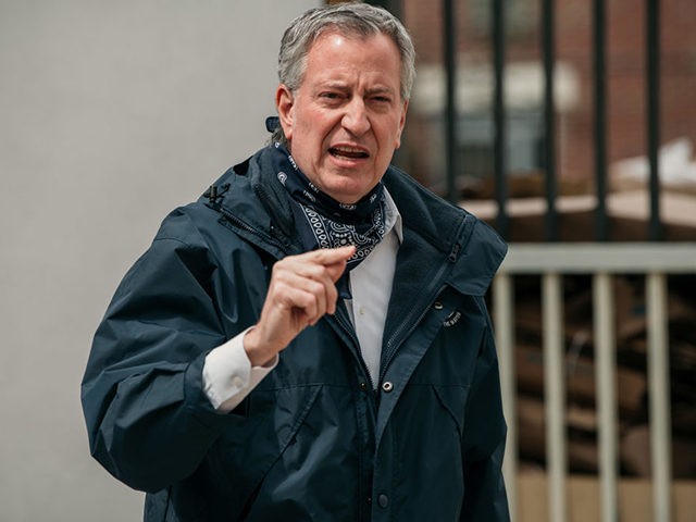 NEW YORK, NY - APRIL 14: New York City Mayor Bill de Blasio speaks at a food shelf organized by The Campaign Against Hunger in Bed Stuy, Brooklyn on April 14, 2020 in New York City. Before touring the facility de Blasio praised the work of food shelves and community …