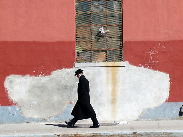 Orthodox Jewish man walks in Brooklyn.