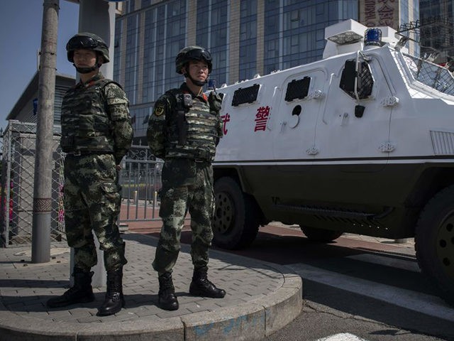 Paramilitary police officers secure the entrance of the Belt and Road Forum venue in Beijing on April 26, 2019. - Chinese President Xi Jinping sought to bat away concerns about his ambitious Belt and Road Initiative, saying his global infrastructure project will have "zero tolerance" for corruption while vowing to …