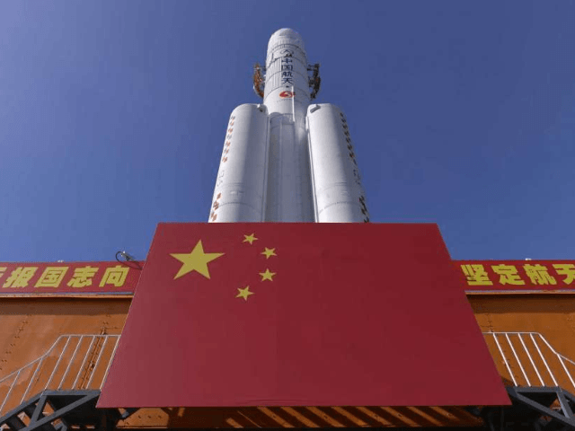 In this photo released by China's Xinhua News Agency, a Long March-5 rocket is seen at the Wenchang Space Launch Center in south China's Hainan Province, Friday, July 17, 2020. China launched its most ambitious Mars mission yet on Thursday, July 23, 2020 in a bold attempt to join the …
